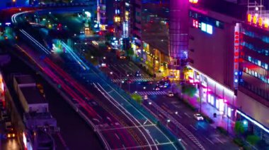 A night timelapse of the traffic jam at the crossing in Ginza long shot