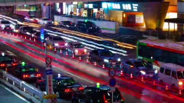 Uma cronologia noturna da rua neon em Shibuya panning — Vídeo de Stock