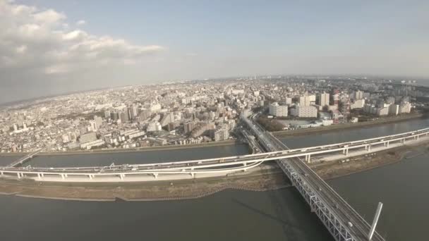 Uma paisagem urbana por tiro aéreo na cidade urbana de Tóquio — Vídeo de Stock