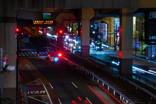 A night traffic on the urban street in Ikejiriohashi middle shot