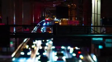 Ikejiriohashi 'deki şehir caddesindeki trafik gece zoom' u