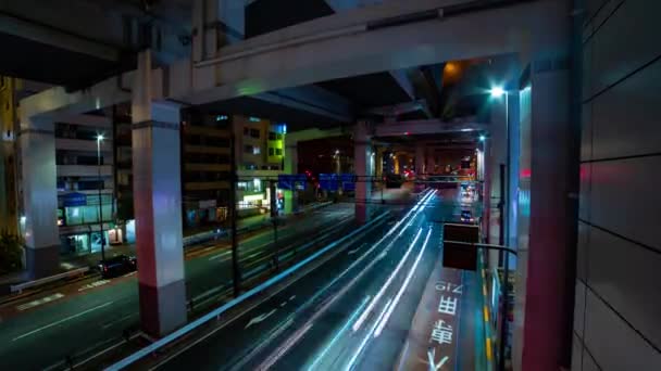 Un timelapse notturno del traffico sulla strada urbana di Ikejiriohashi grandangolo zoom — Video Stock
