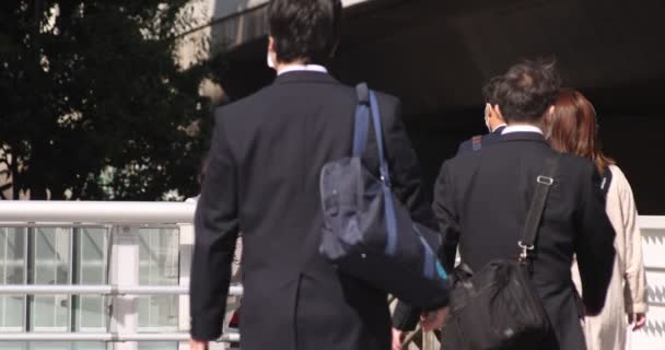 En slow motion av vandrande människor i staden Shibuya — Stockvideo