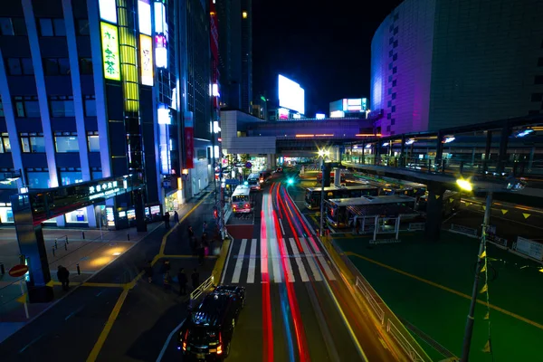 En natt timelapse av neon gatan i Shibuya bred skott — Stockfoto