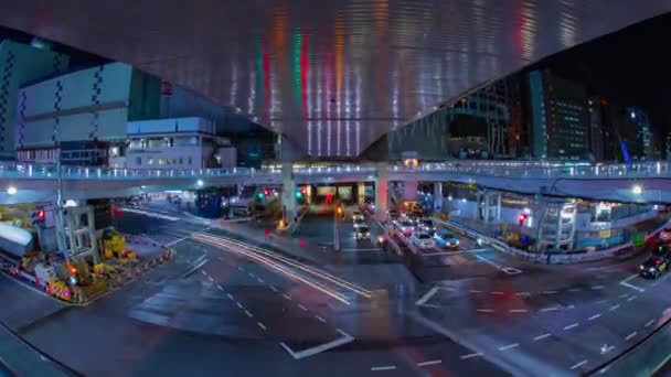 Un timelapse notturno della strada al neon a Shibuya fish eye shot zoom — Video Stock