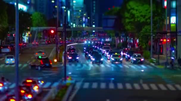 Un timelapse nocturno de la calle urbana en miniatura en Aoyama tiltshift basculante — Vídeo de stock