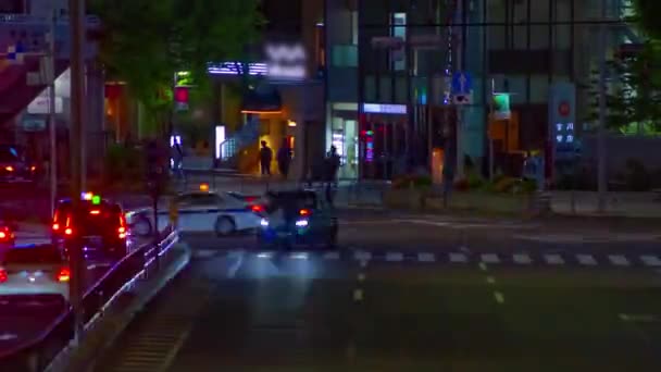 Sebuah malam timelapse dari jalan kota perkotaan di Aoyama tembakan panjang zoom — Stok Video