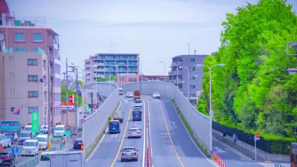 En timelapse av trafikstockning på centrala avenyn dagtid lutning — Stockvideo