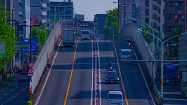 Un timelapse de atasco de tráfico en el centro de la avenida diurna inclinación largo tiro — Vídeo de stock