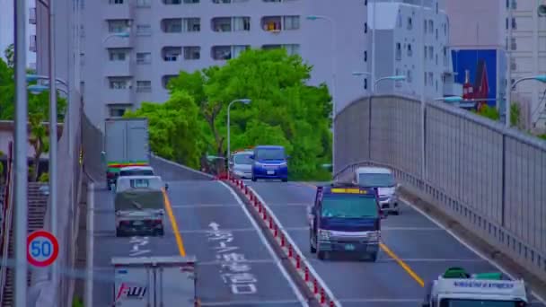 En timelapse av trafikstockning på centrala avenyn dagtid långskott lutning — Stockvideo