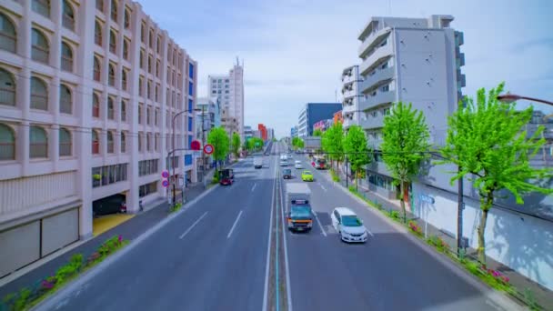 En timelapse av downtown street på avenyn dagtid bred skott lutning — Stockvideo