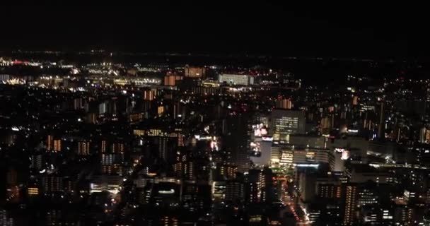 Noite aérea iluminada vista da cidade em Tóquio — Vídeo de Stock