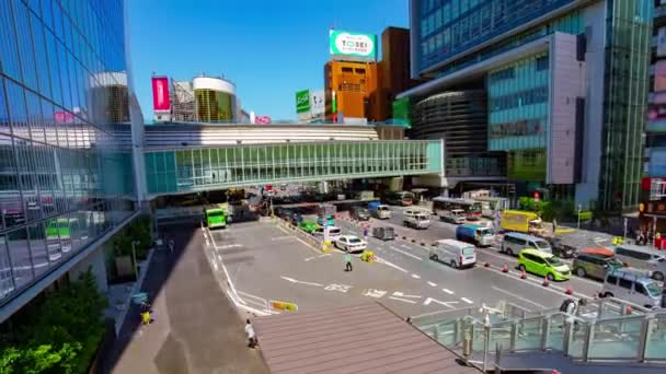 Een tijdspanne van de verkeersopstopping in de stedelijke stad in de buurt van Shibuya station brede schot zoom — Stockvideo