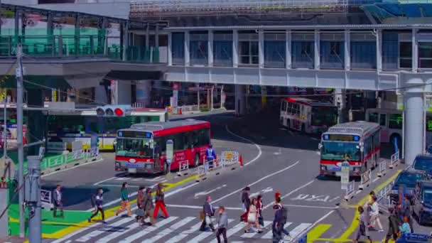 渋谷駅周辺の都市交通渋滞のタイムラプスロングシュートズーム — ストック動画