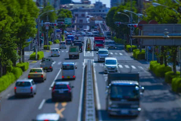 A timelapse of miniature traffic jam at the avenue daytime in the downtown tiltshift — Stock Photo, Image