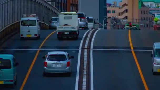 A timelapse of traffic jam at the avenue daytime in the downtown long shot panning — Stock Video