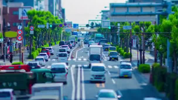 Un timelapse d'embouteillage miniature à l'avenue de jour dans le centre-ville tiltshift zoom — Video