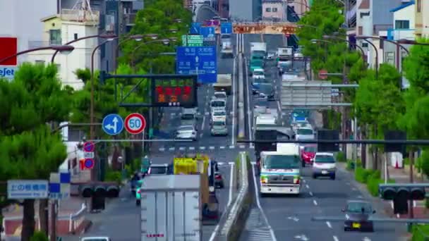 Sebuah kemacetan lalu lintas di jalan siang di pusat kota panning tembakan panjang — Stok Video