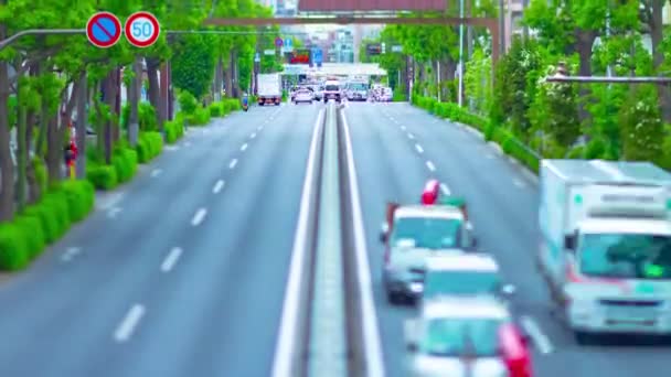 En timelapse af miniature trafikprop på avenue dagtid i downtown tiltshift vippe – Stock-video