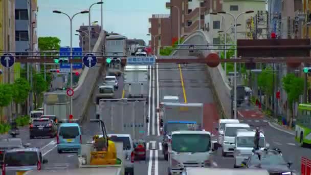 A timelapse of traffic jam at the avenue daytime in the downtown long shot tilt — Stock Video