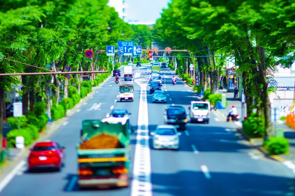 A miniature traffic jam at the avenue daytime in the downtown tiltshift — Stock Photo, Image