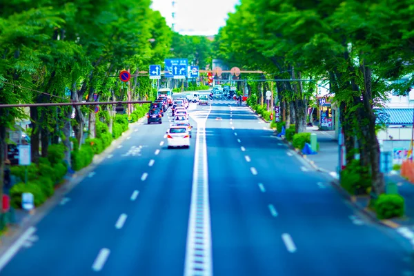 A miniature traffic jam at the avenue daytime in the downtown tiltshift — Stock Photo, Image