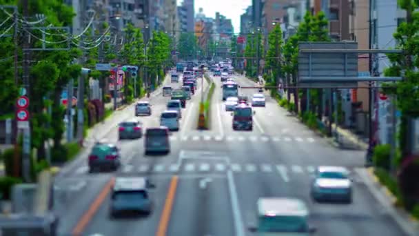 A timelapse of miniature traffic jam at the avenue daytime in the downtown tiltshift zoom — Stock Video