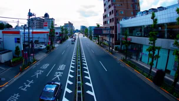 A timelapse of traffic jam at the avenue daytime in the downtown fish eye shot panning — Stock Video
