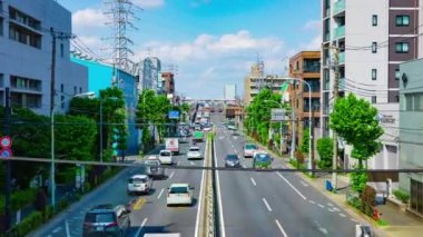 Tokyo 'nun şehir merkezindeki caddede gündüz vakti meydana gelen trafik sıkışıklığının zamanlaması.