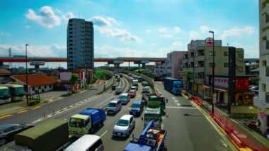 Tokyo 'nun şehir merkezindeki caddede gündüz vakti meydana gelen trafik sıkışıklığının zamanlaması.
