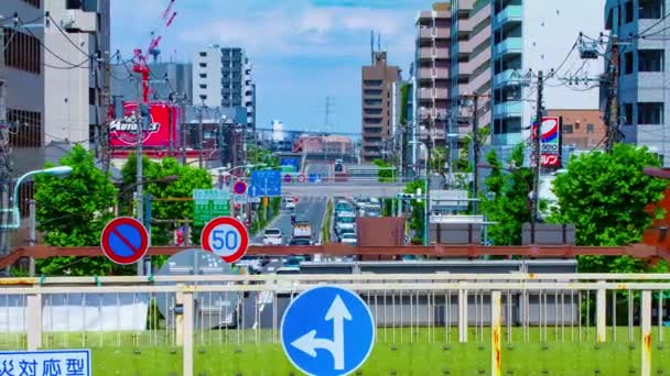 Közlekedési dugó a belvárosi utcában Tokióban, nappali menetvágányon. — Stock videók