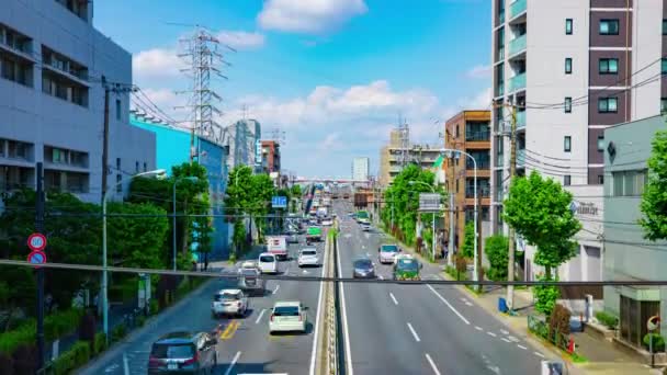 Timelapse korka na śródmieściu ulica w Tokio dzienny szeroki strzał tilt — Wideo stockowe