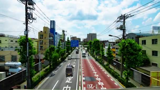 Uma cronologia do engarrafamento no centro da rua em Tóquio zoom de tiro largo diurno — Vídeo de Stock