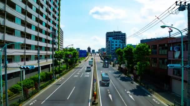 Tokyo 'nun şehir merkezindeki caddede gündüz vakti meydana gelen trafik sıkışıklığının zamanlaması. — Stok video