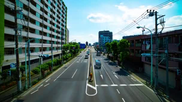 Un timelapse de atasco de tráfico en la calle del centro de Tokio en todo el día tilt tiro — Vídeos de Stock