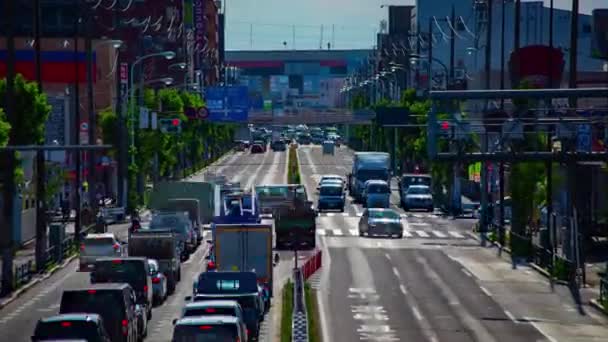 Sebuah kemacetan lalu lintas di jalan pusat kota di Tokyo daytime tembakan panjang zoom — Stok Video