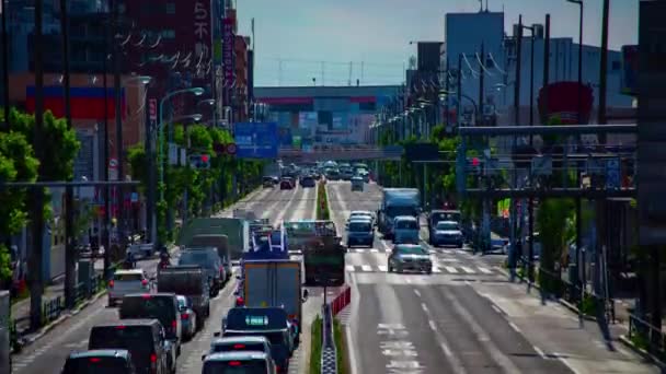 Sebuah kemacetan lalu lintas di jalan pusat kota di Tokyo siang hari kemiringan panjang — Stok Video