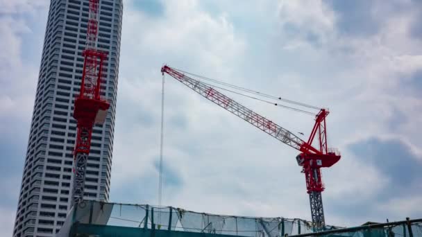 新宿ロングショット傾きの地下建設でクレーンのタイムラプス — ストック動画