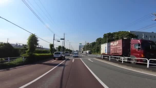 Sebuah pov mengemudi kota di jalan perkotaan di Tokyo — Stok Video
