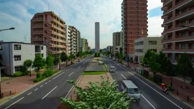 A timelapse of traffic jam at the avenue in the downtown in Tokyo wide shot zoom