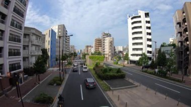 A timelapse of traffic jam at the avenue in the downtown in Tokyo wide shot