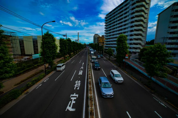 昼間ワイドショット東京・金八通りでの自動車道のタイムラプス — ストック写真