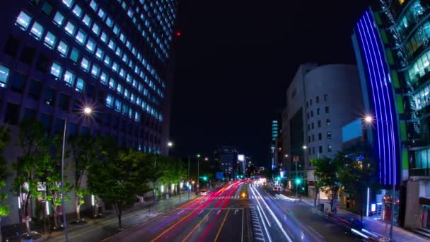 A night timelapse of traffic jam at the city street in Aoyama fish eye shot panning — Stock Video