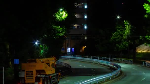 A night timelapse of traffic jam at the city street in Aoyama panning — Wideo stockowe