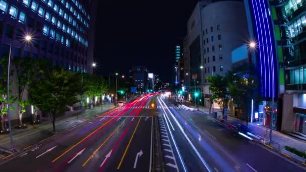 Sebuah malam tiLapse kemacetan lalu lintas di jalan kota di Aoyama mata ikan ditembak zoom — Stok Video
