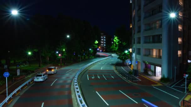 Un lapso de tiempo nocturno de atasco de tráfico en la calle de la ciudad en Aoyama tiro ancho — Vídeos de Stock