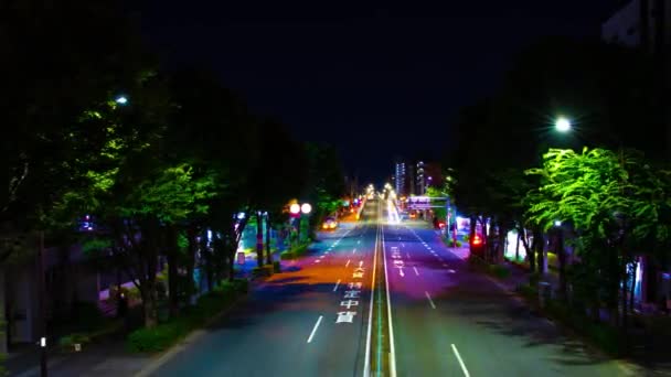 Un lapso de tiempo nocturno de atasco de tráfico en la calle del centro de Tokio panorámica de tiro ancho — Vídeos de Stock