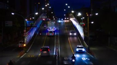 Tokyo 'nun şehir merkezindeki caddenin uzun vadeli bir zaman çizelgesi