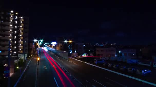 Un timelapse notturno della strada del centro di Tokyo grandangolo zoom — Video Stock