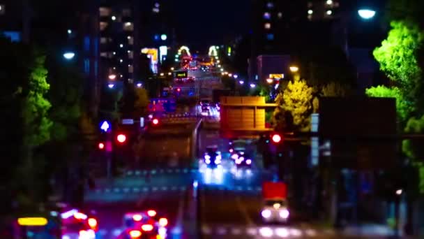 Uma cronologia noturna da rua miniatura do centro da cidade em Tóquio tiltshift panning — Vídeo de Stock